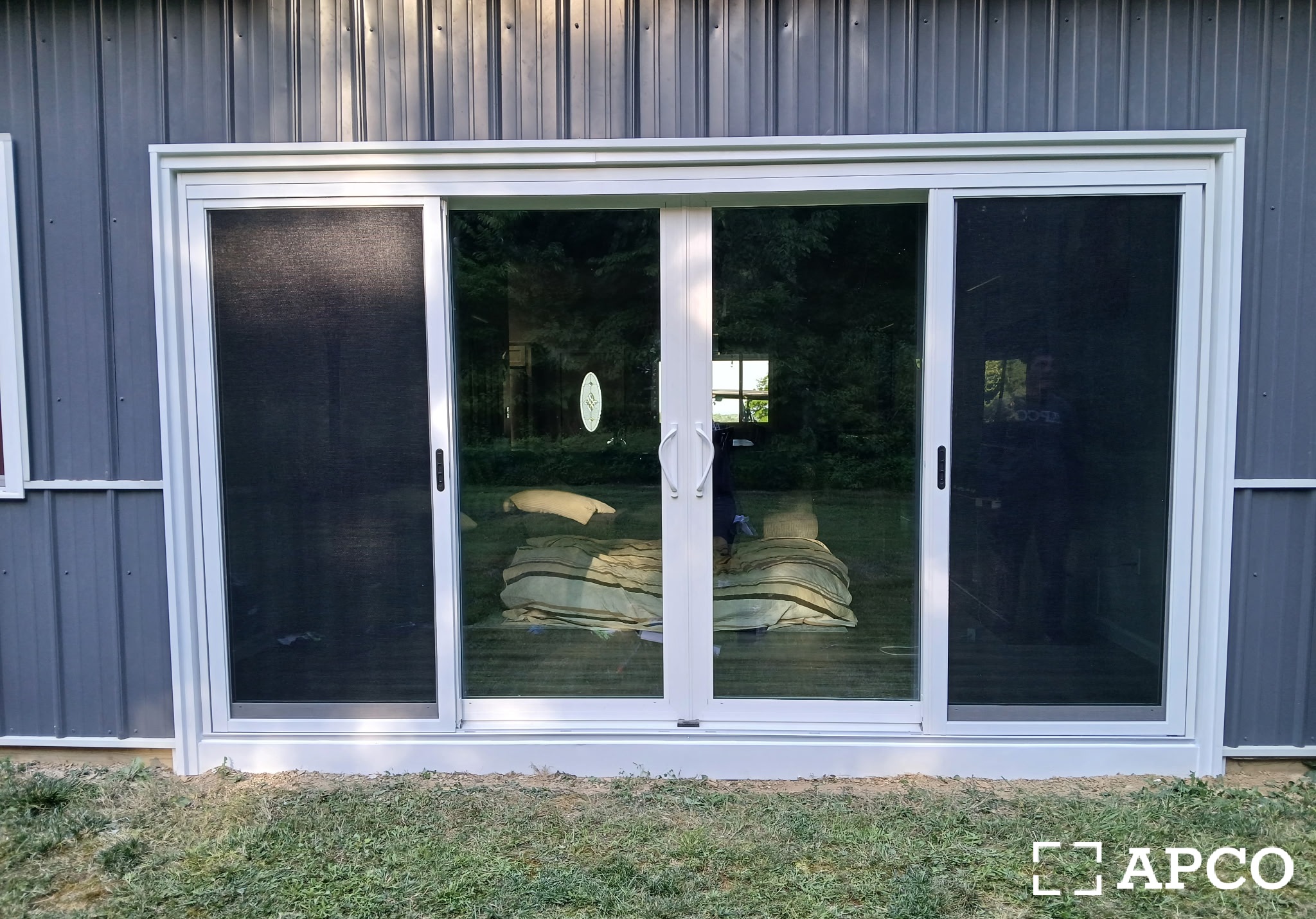 New sliding patio doors installed on a home exterior